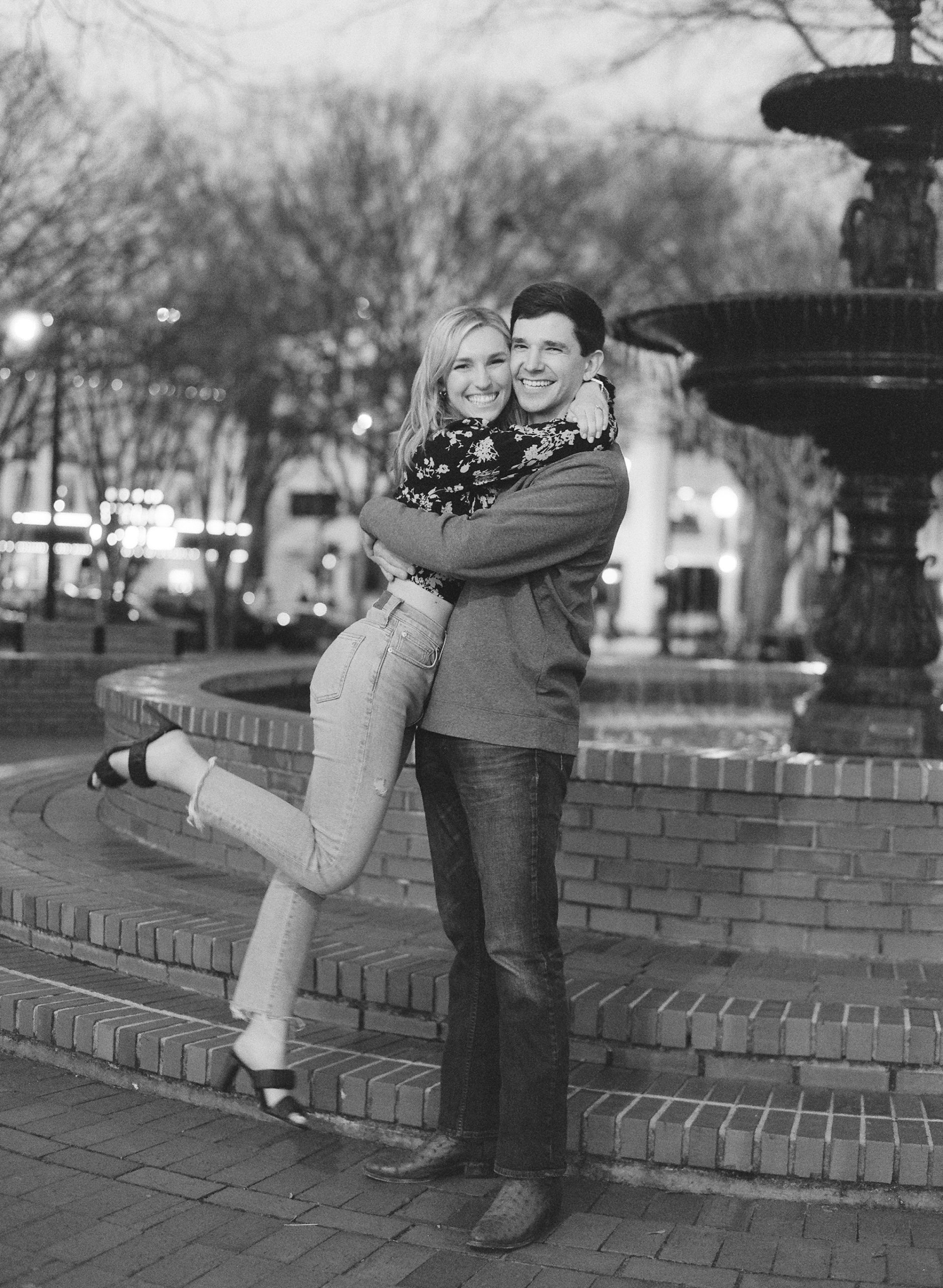 Black and White of Couple Hugging Marietta Square Proposal Photo