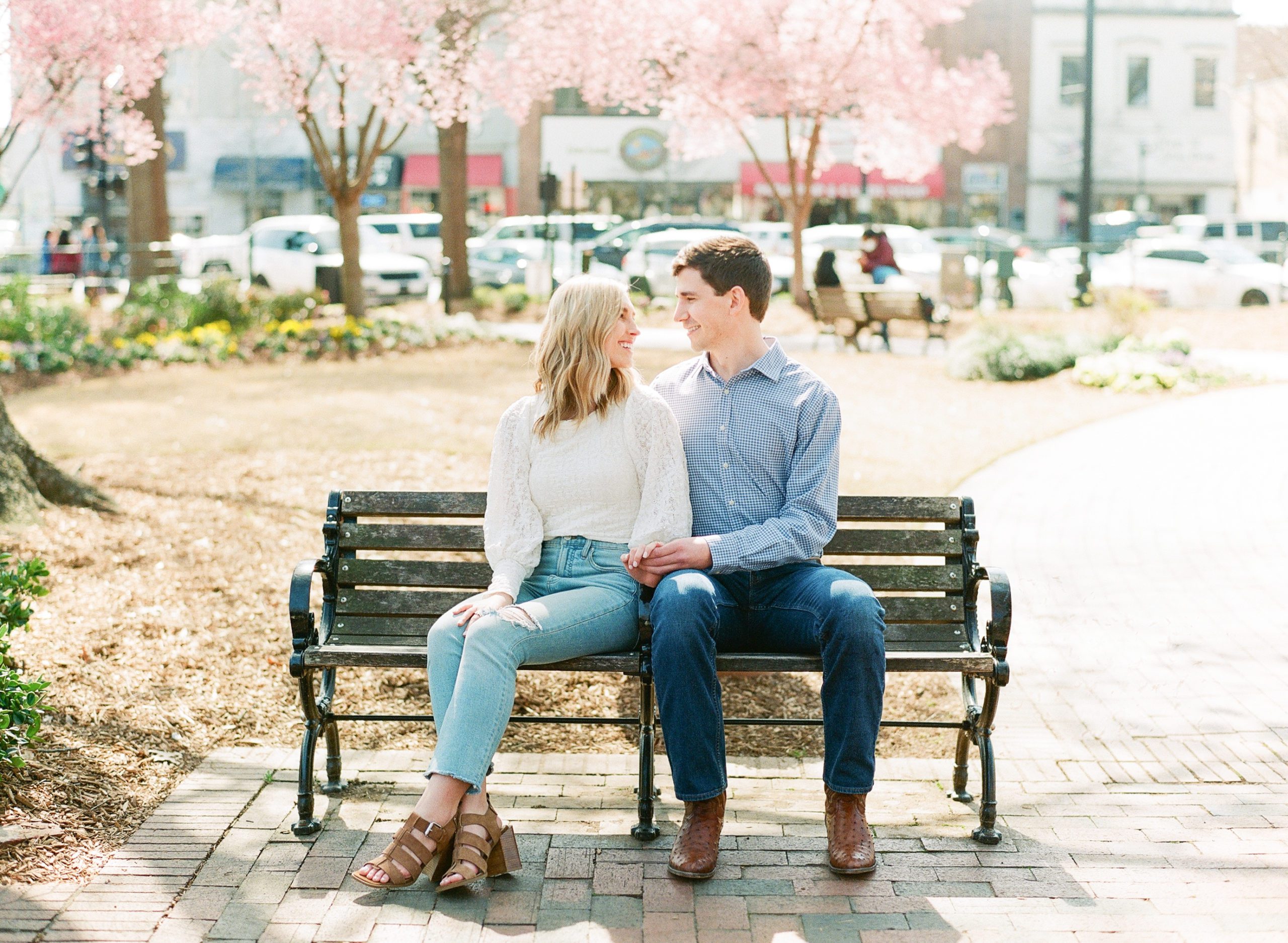 Marietta Square Engagement Photo Session Couple Smiling On Bench Photo