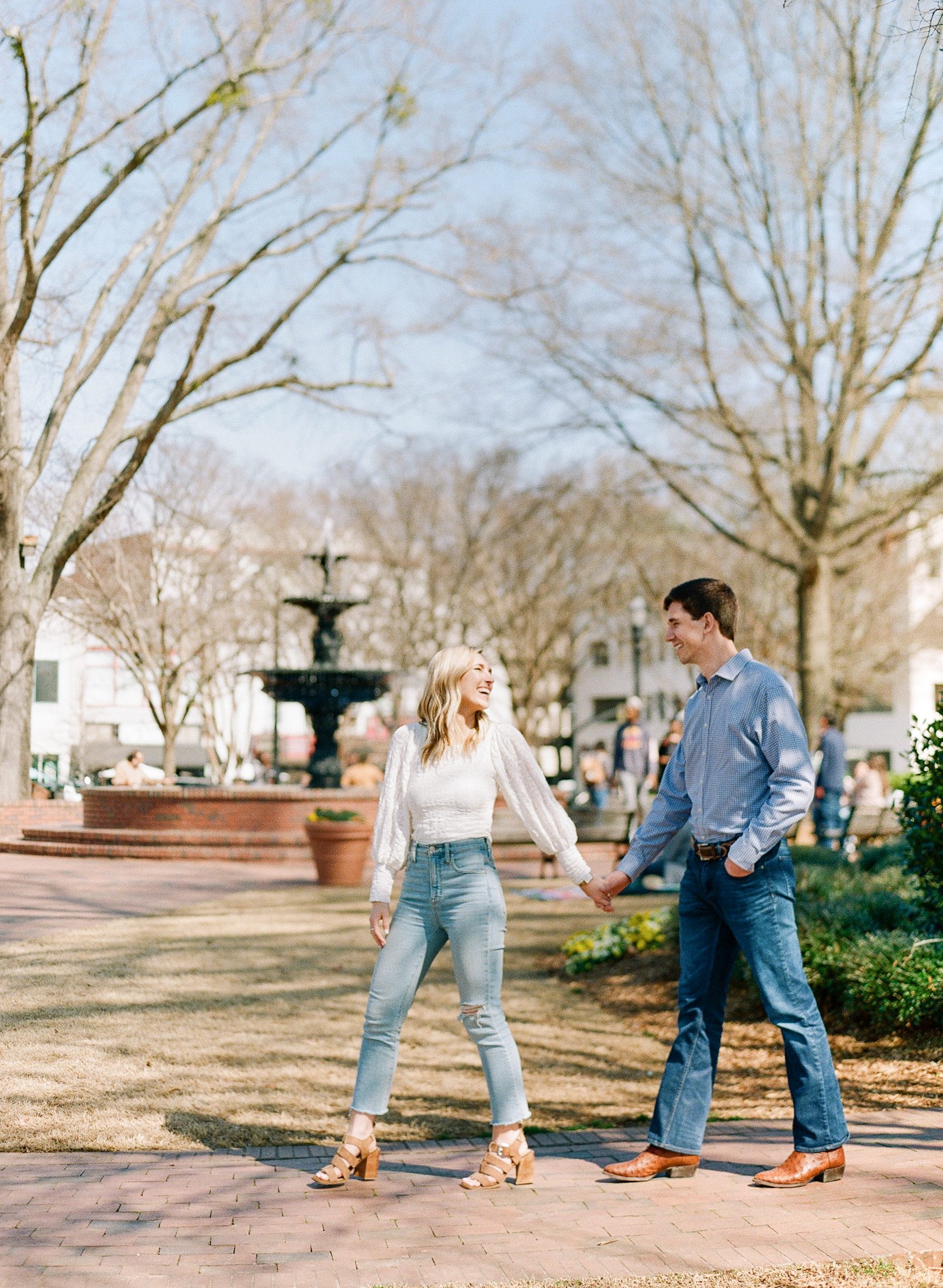 Marietta Square Engagement Session Couple Holding Hands Photo