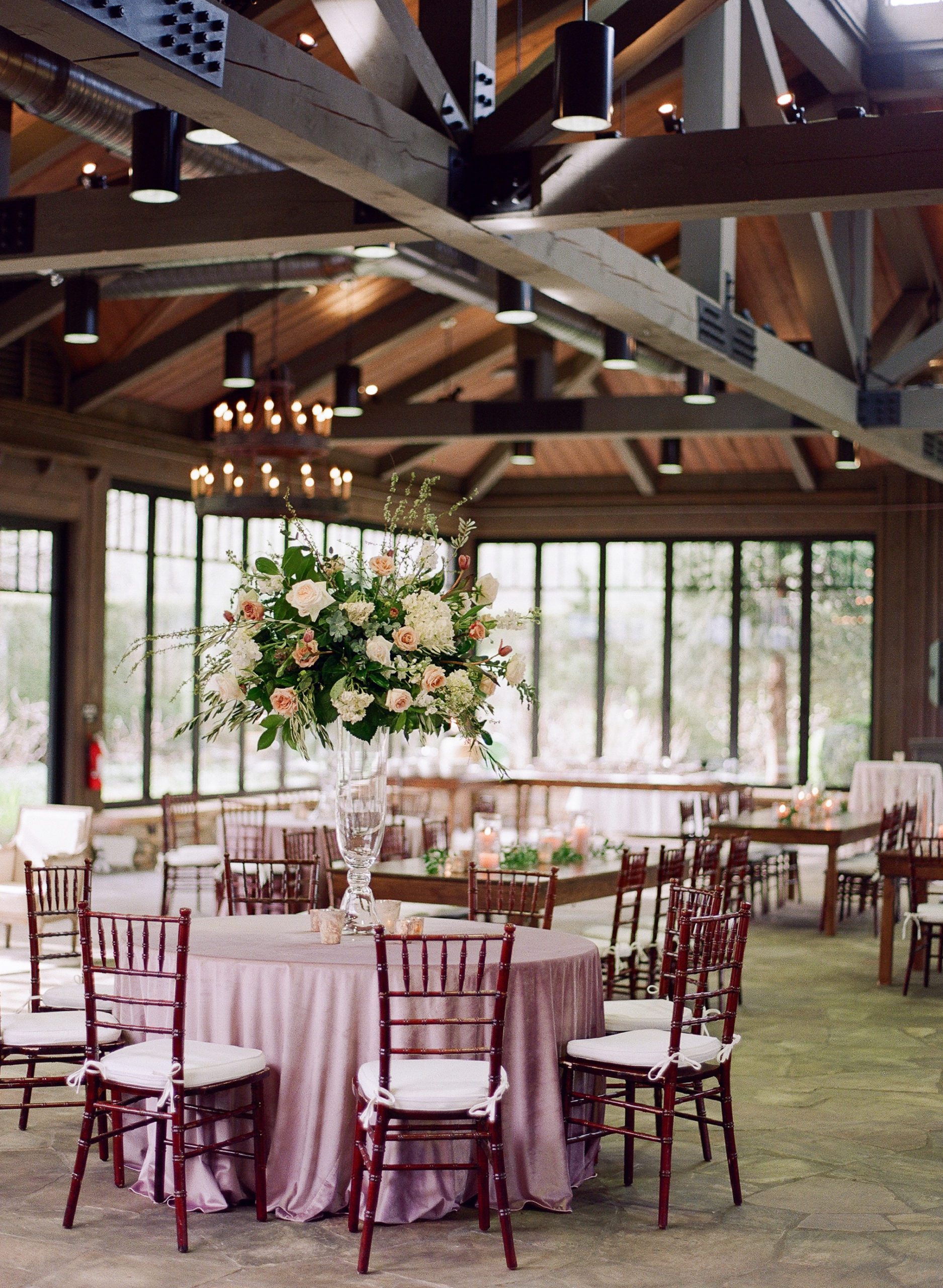 Wedding Reception Table with Velvet Mauve Tablecloths Photo