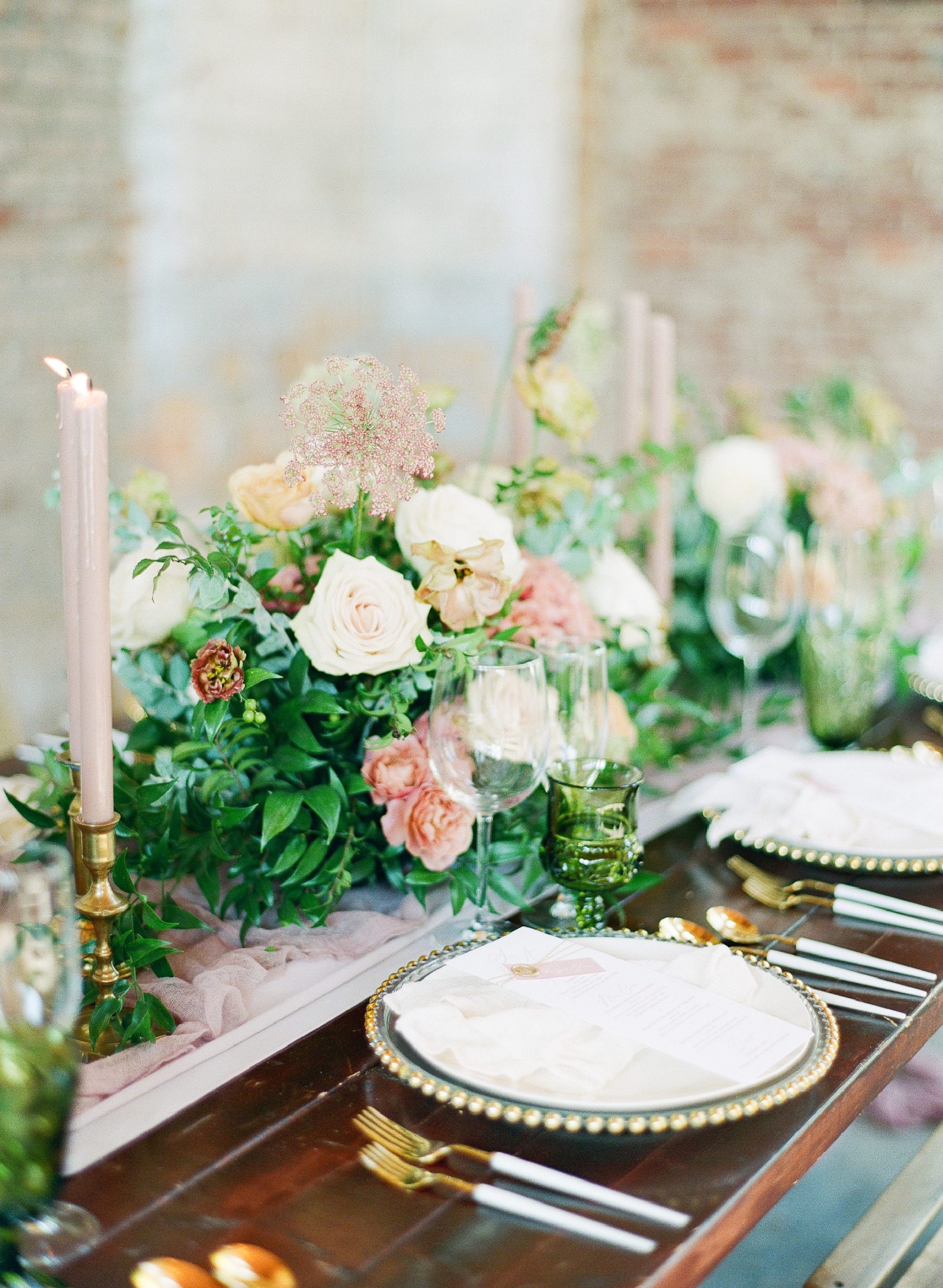 Wedding Reception Table with Pink Candles and Flowers Photo