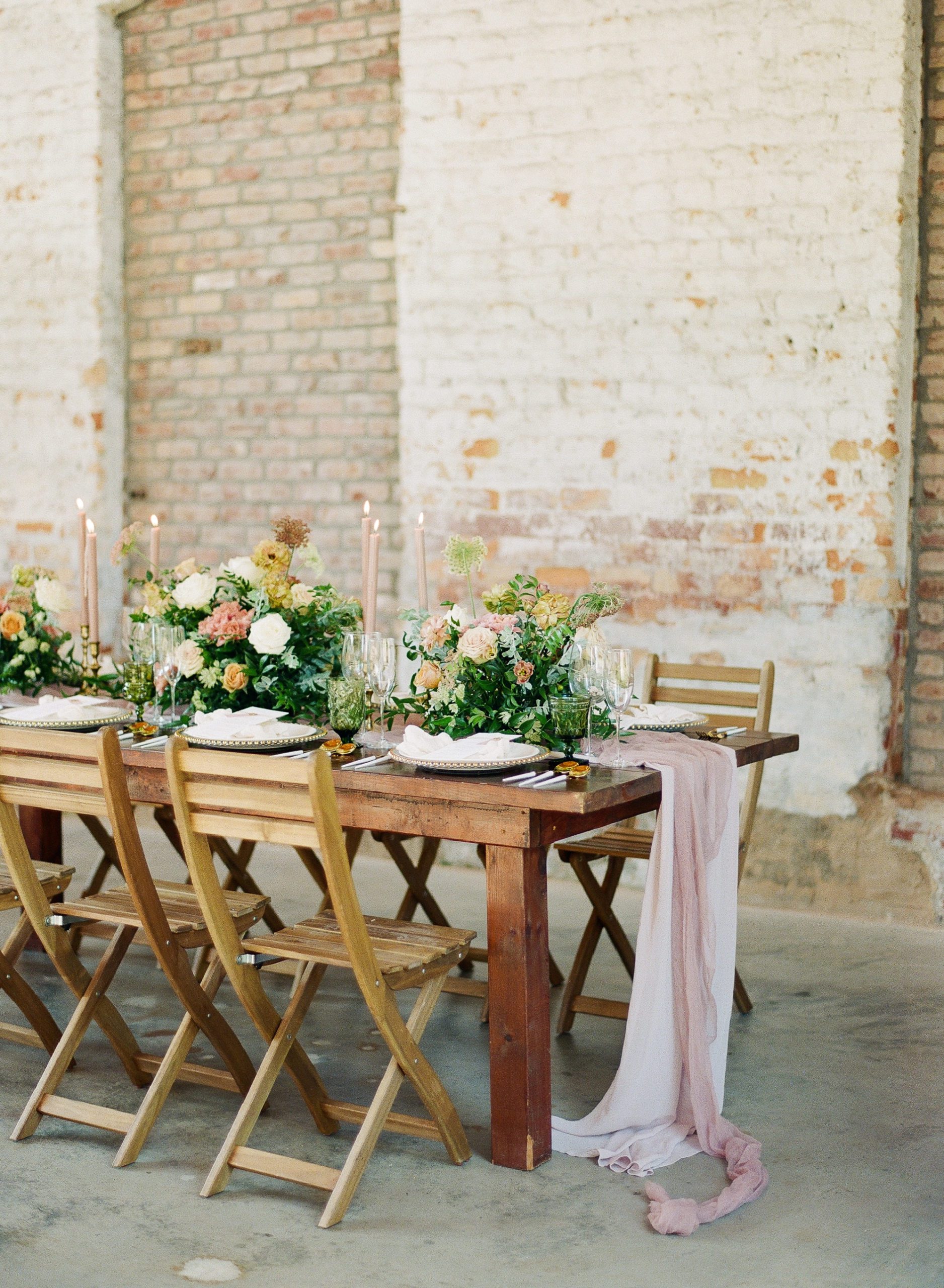 Wedding Reception Table with Pink Candles and Table Runner Photo