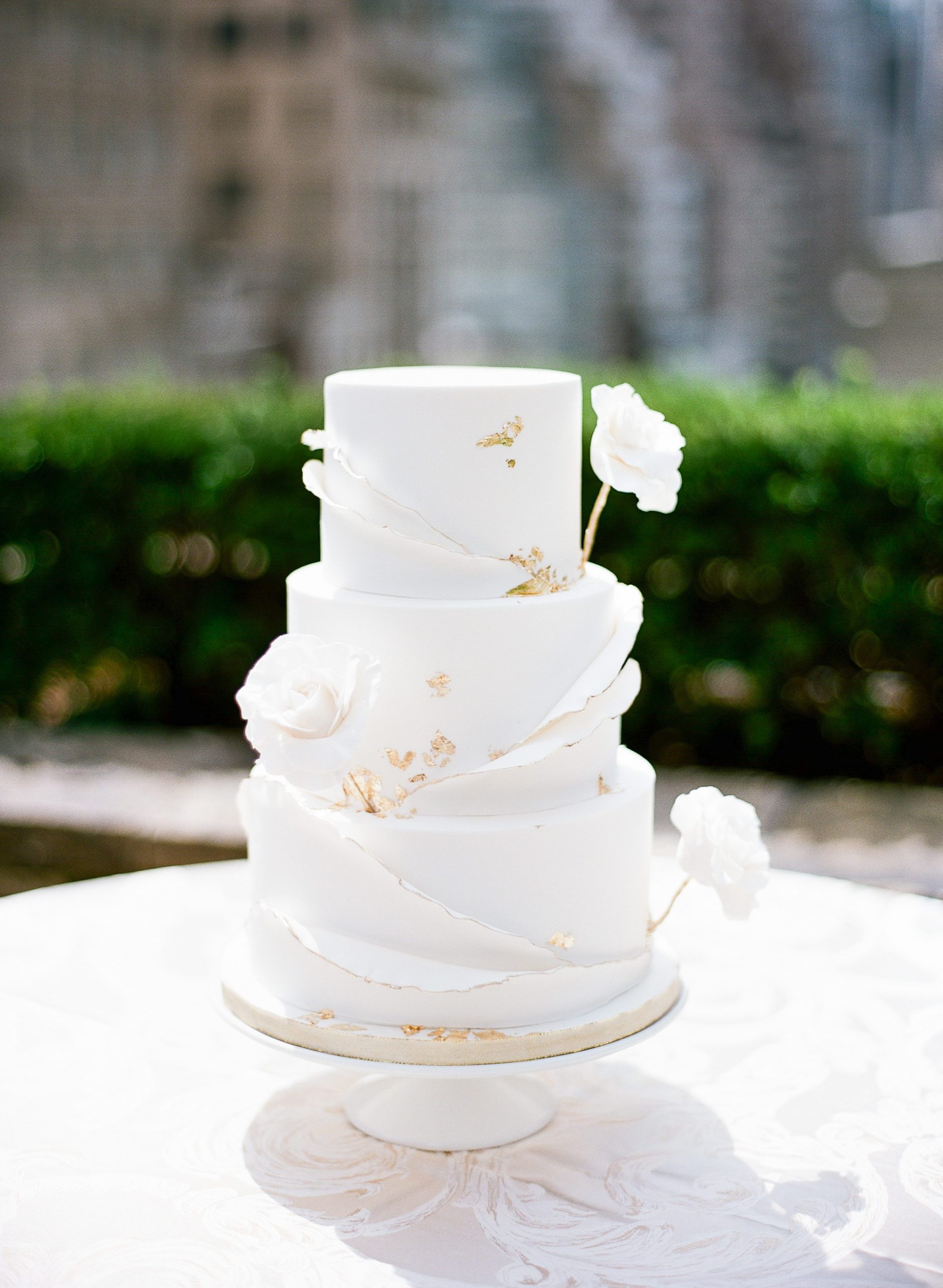 White Cake with Gold Leafing Wedding Cake Ideas Photo