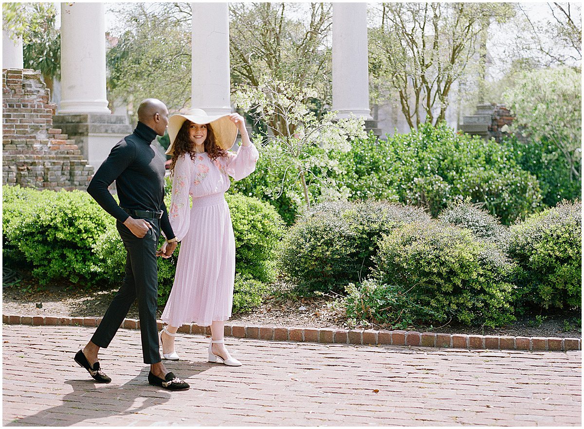 Charleston Engagement Photos Couple Strolling In Park Photos