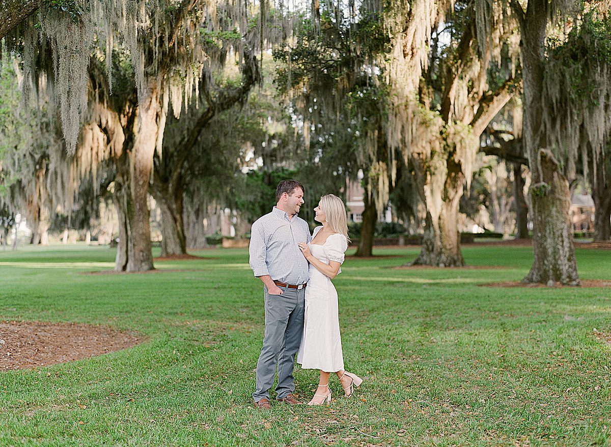 Couple in Trees covered in Spanish Moss in The Ford Field & River Club Photo