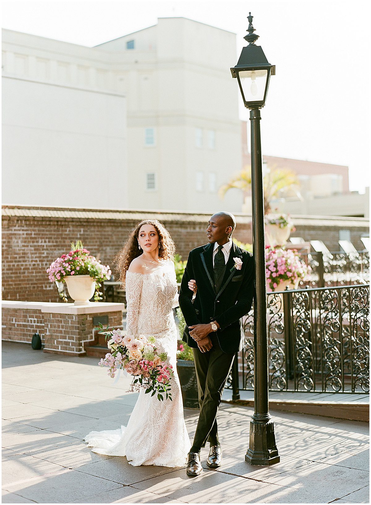 Bride and Groom on Rooftop of The Mills House Hotel Photo