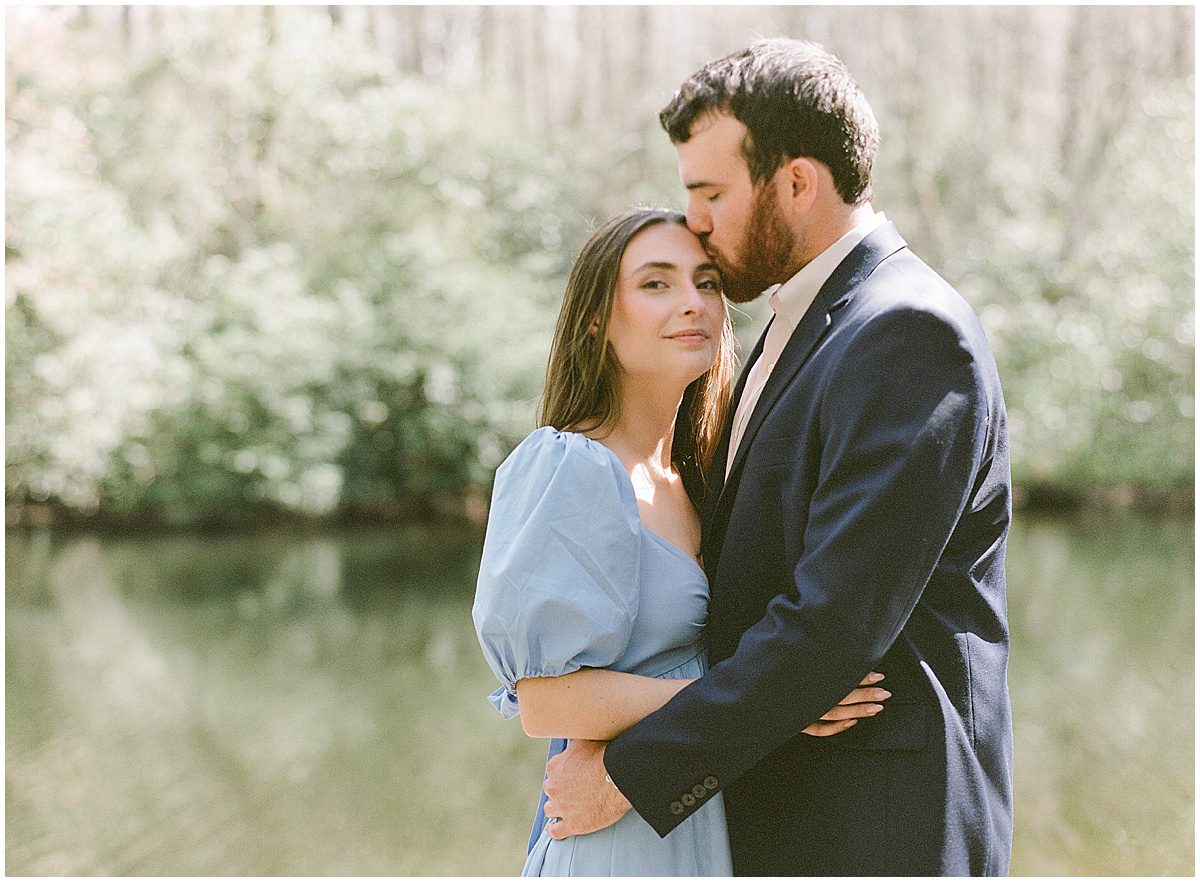 Couple Snuggling at Cashiers NC Engagement Session Photo