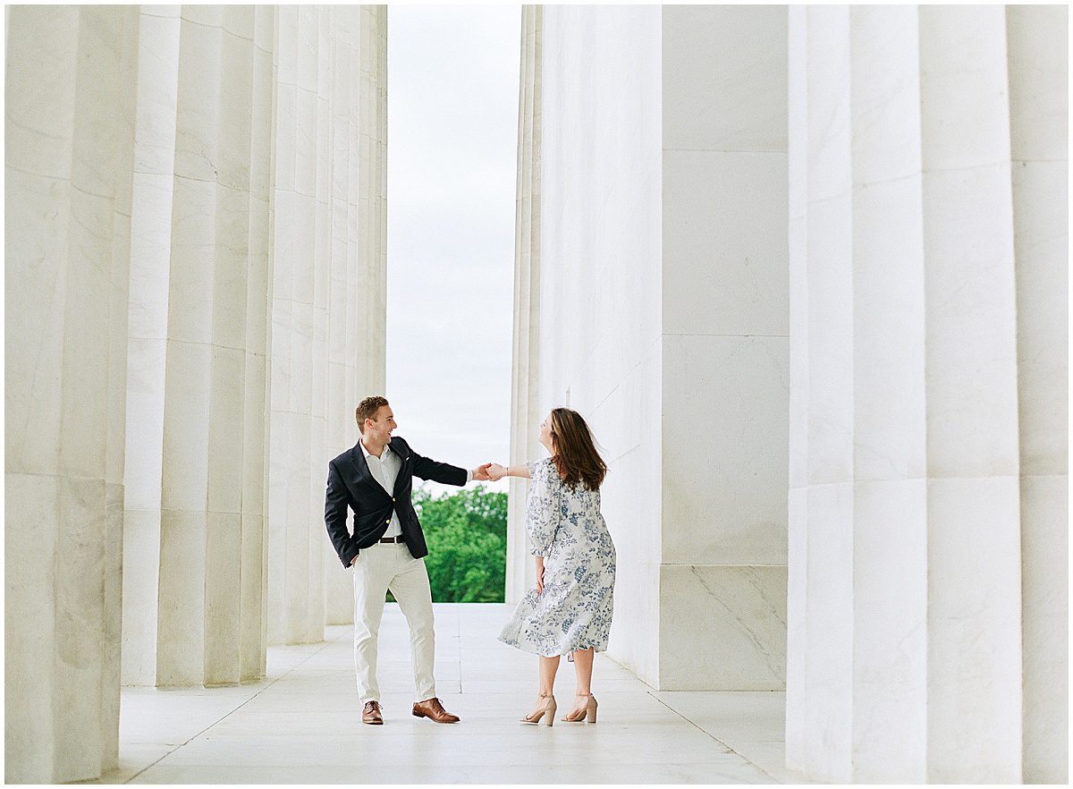 National Mall Engagement Session Couple Twirling Photo