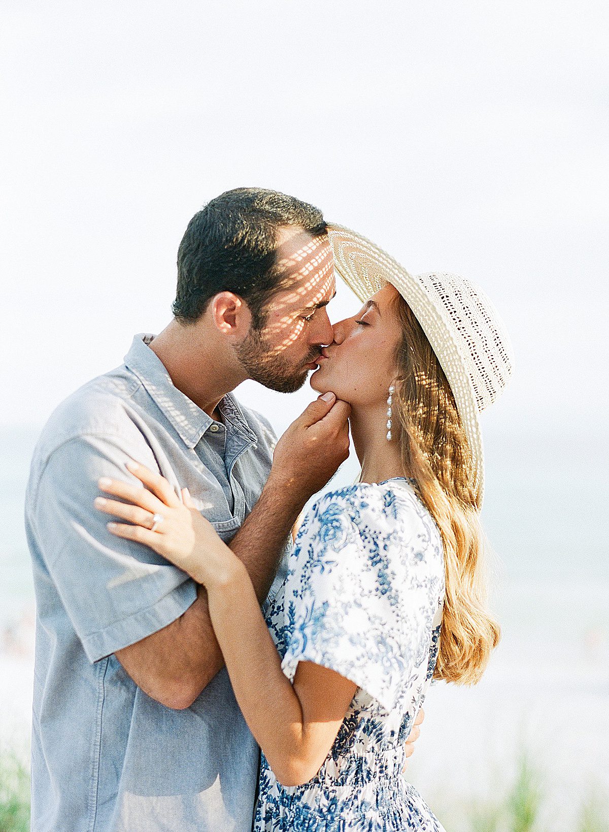 Couple Kissing captured by 30A Wedding Photographer Photo