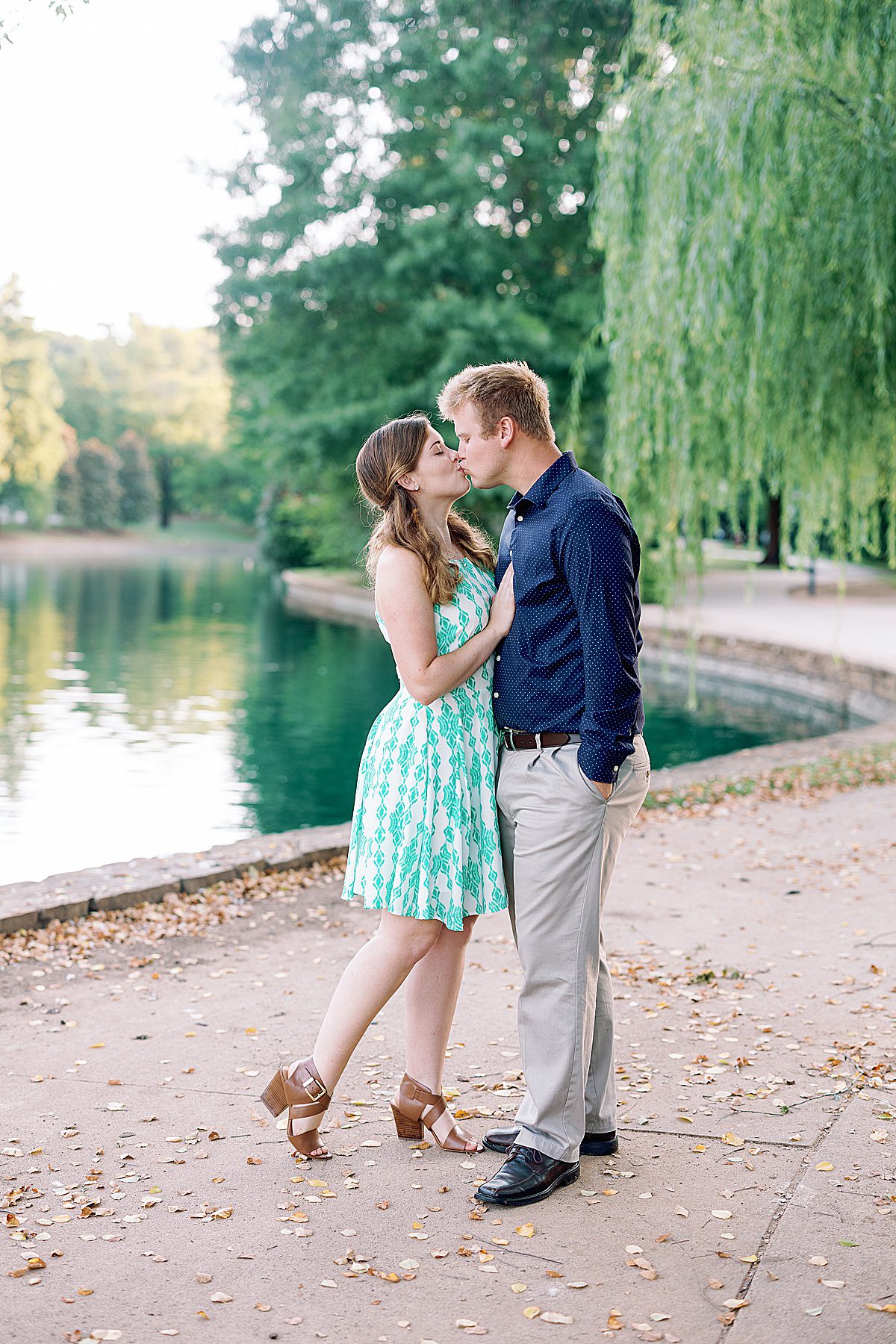 Couple Kissing at Charlotte NC Freedom Park Engagement Session Photo