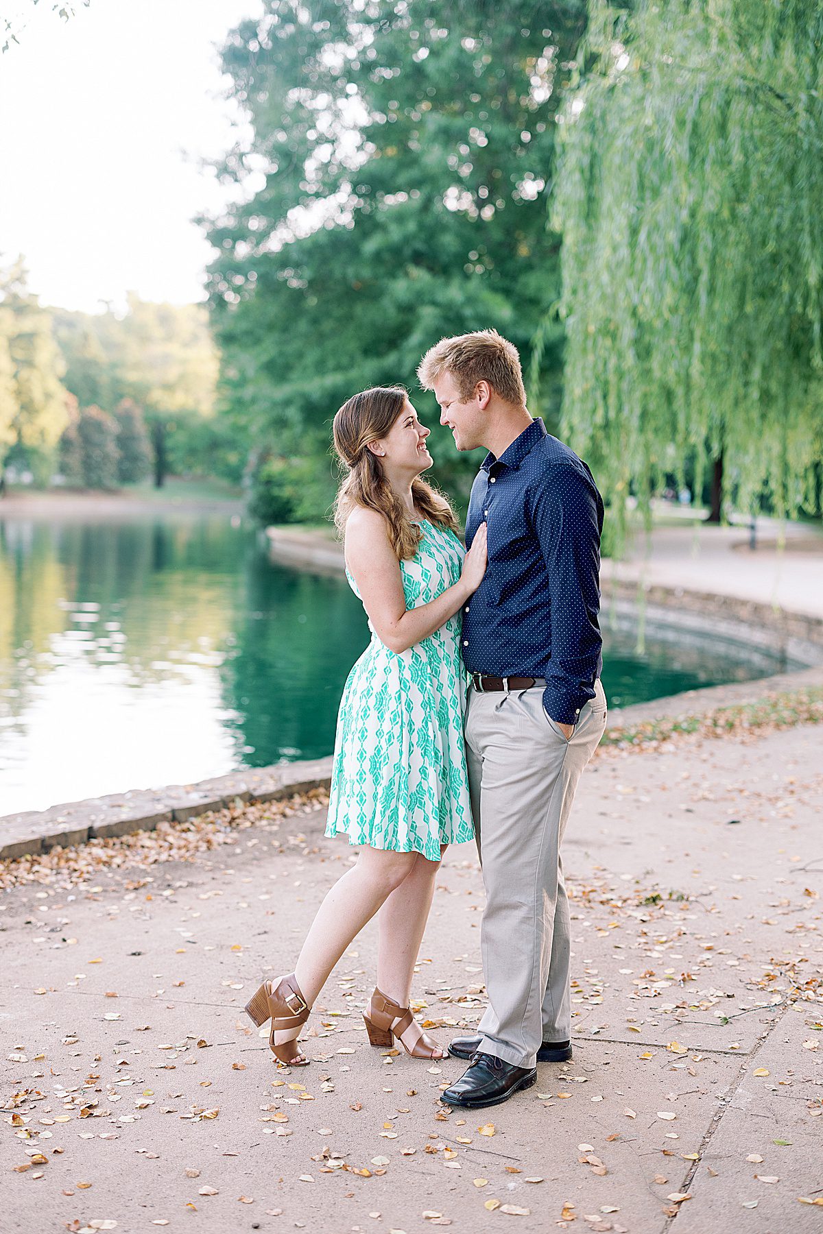 Couple Smiling at Each Other at Charlotte NC Freedom Park Engagement Photo