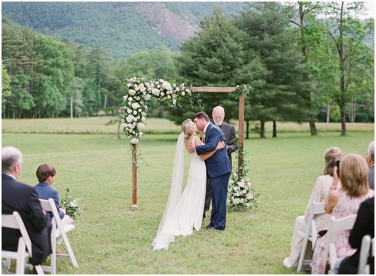 Highlands North Carolina Wedding Ceremony Bride and Groom First Kiss Photo