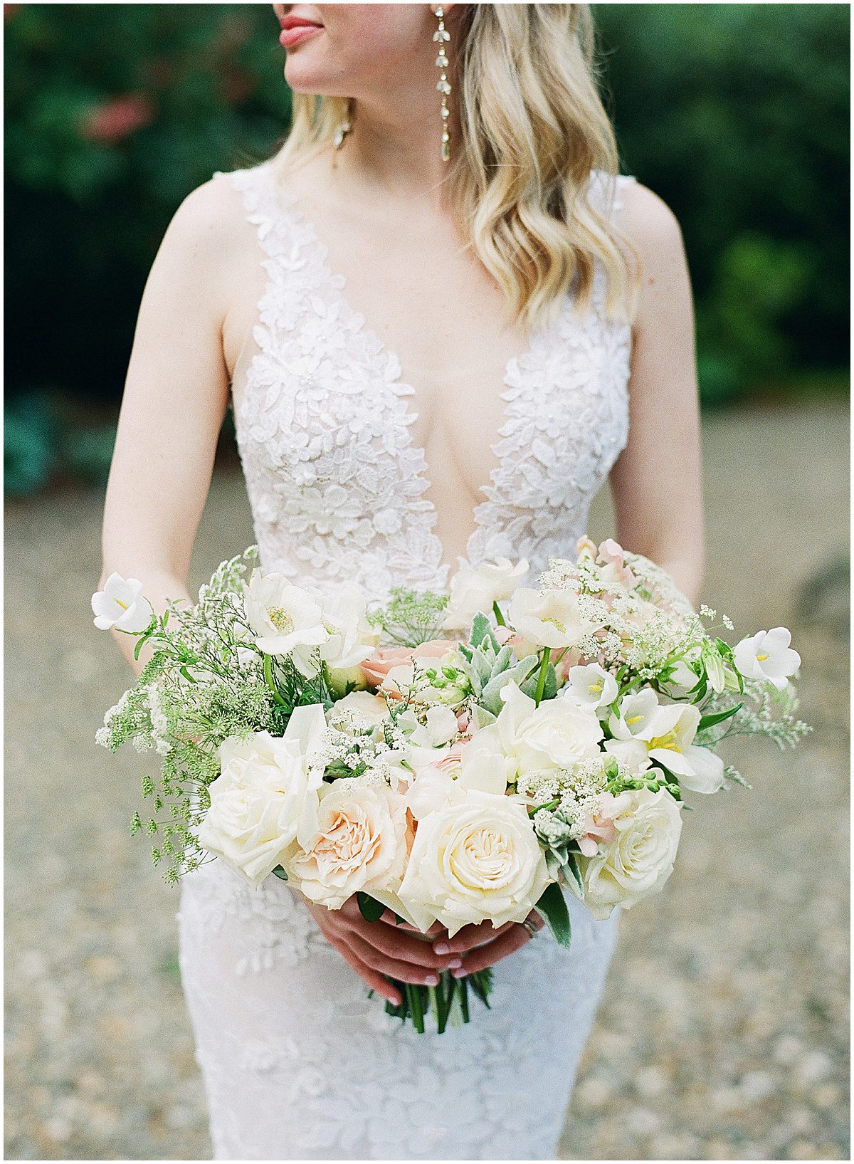 Bride Holding Bouquet at Hutchinson House Wedding Photo