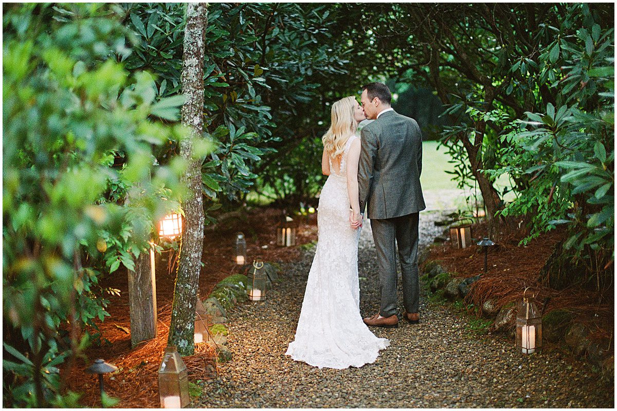 Hutchinson House Wedding Bride and Groom Kissing in the Trees Photo