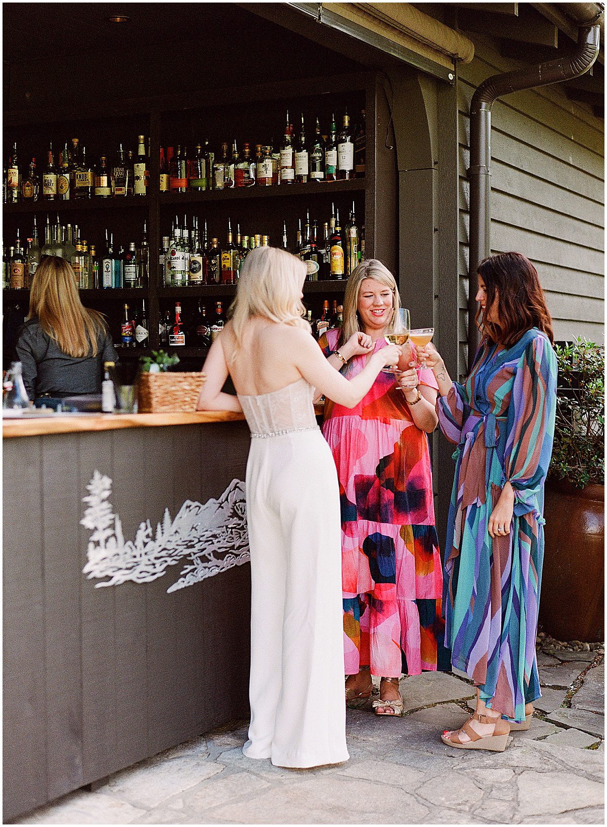 Bride Toasting With Her Sisters at Canyon Kitchen In Lonesome Valley Cashiers NC Photo