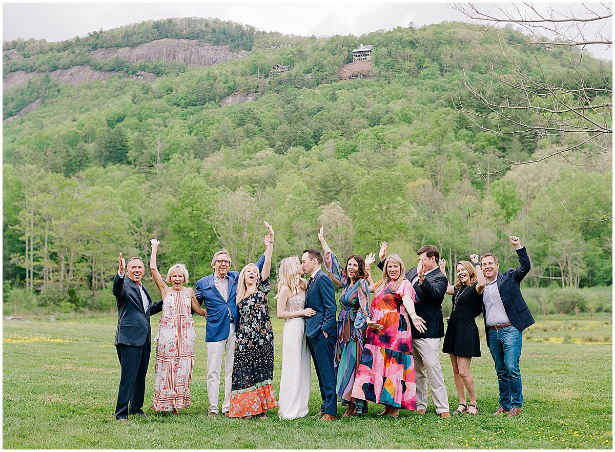 Bride and Groom with Family at Rehearsal Dinner at Lonesome Valley in Cashiers NC Photo