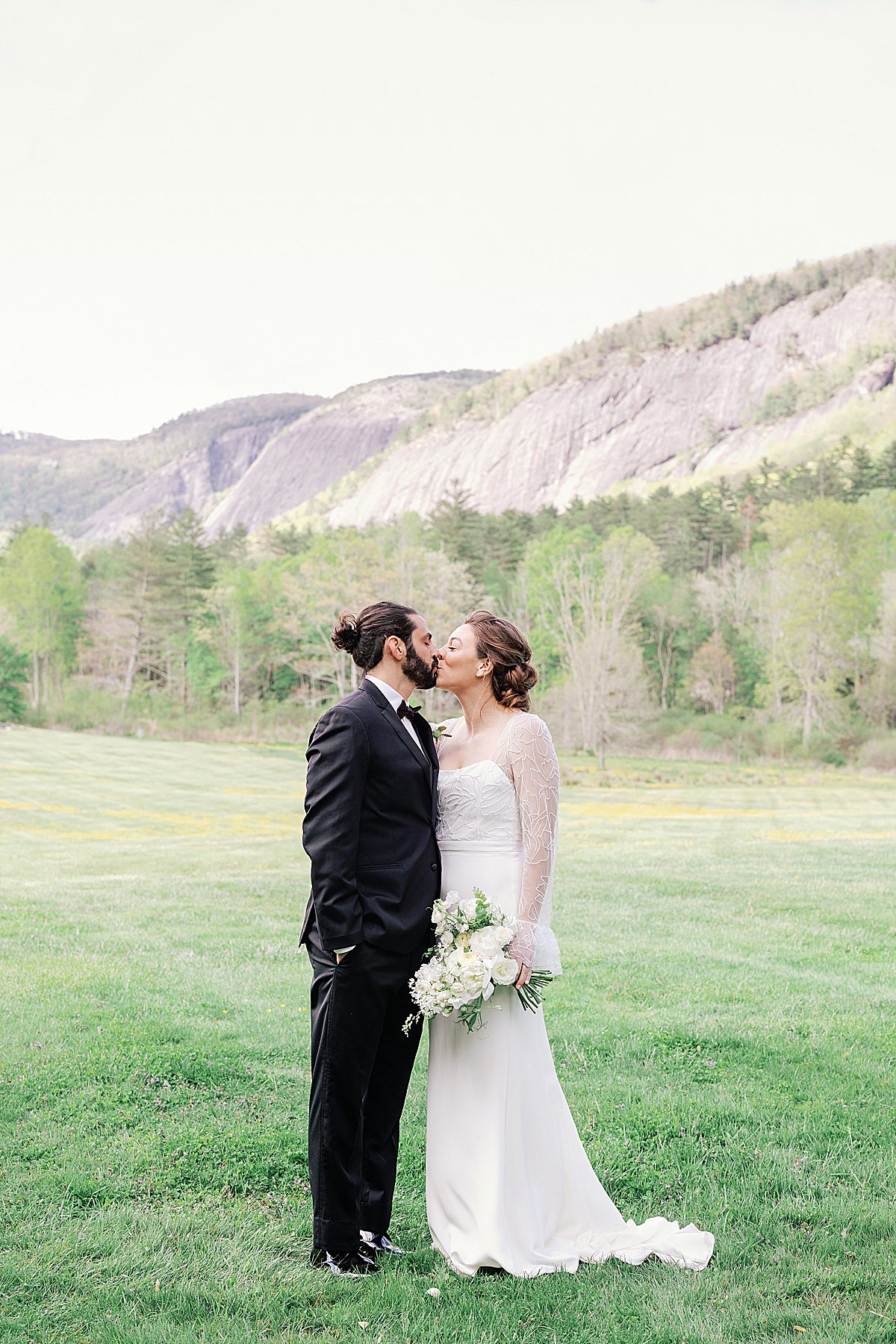 Bride and Groom Kissing at Lonesome Valley Wedding in Cashiers