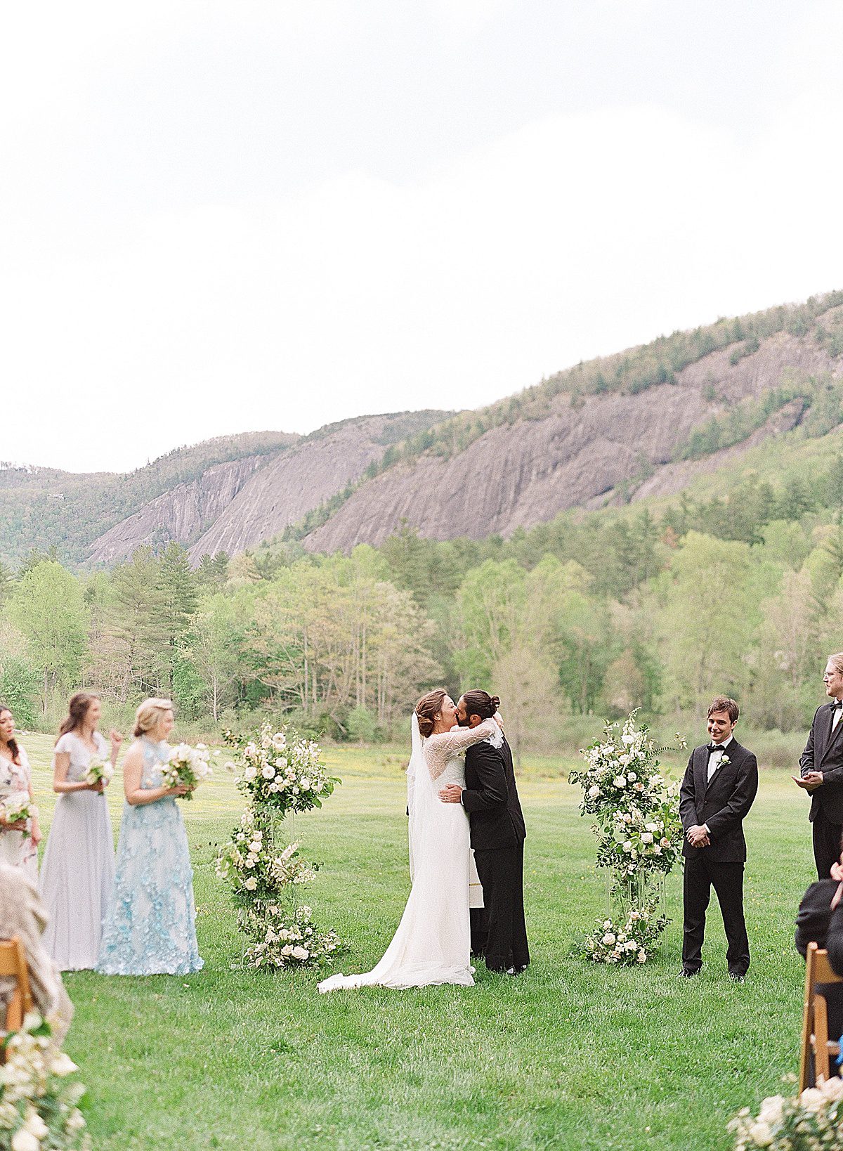 Bride and Grooms First Kiss at Their Lonesome Valley Wedding in Cashiers Photo