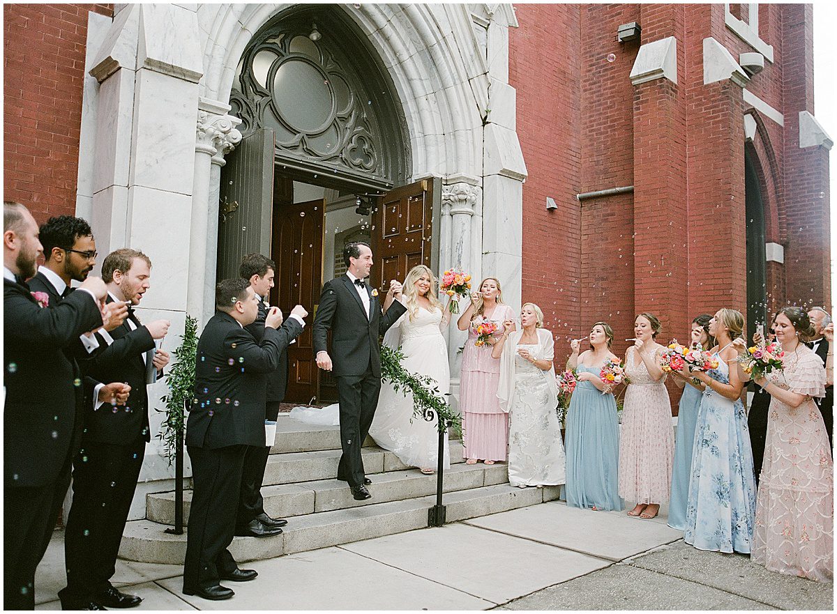 Bride and Groom Bubble Exit at Sacred Heart Church in Savannah Photo