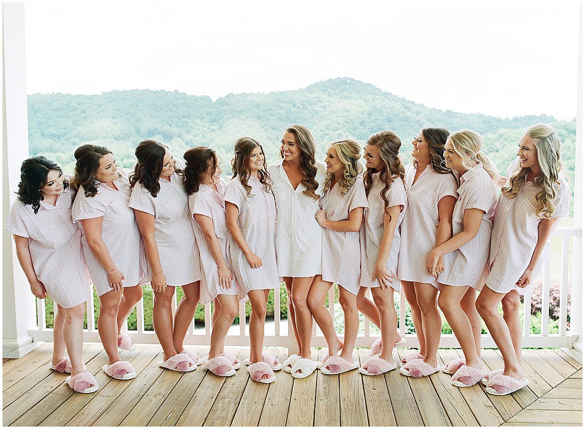 Bride with with Bridesmaids Laughing on Porch at The Ridge Asheville Photo