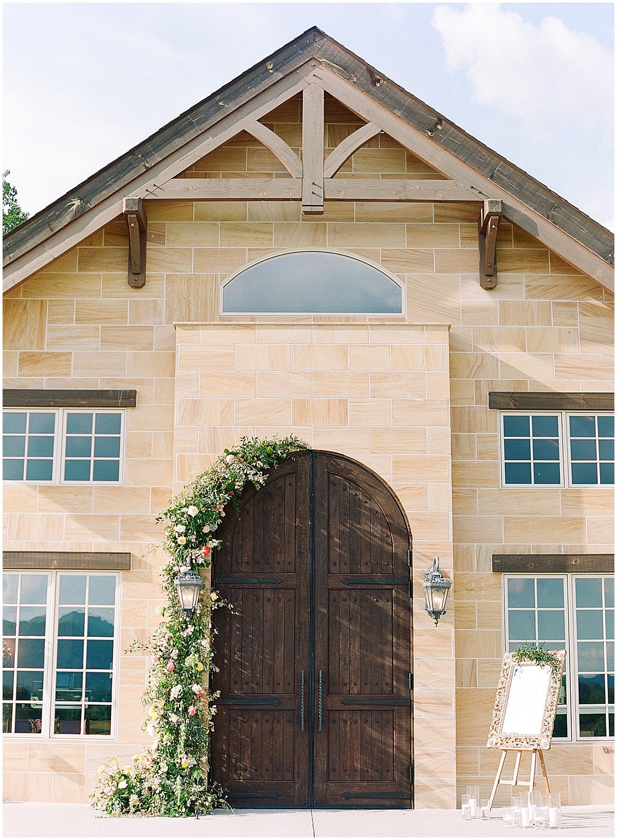 The Ridge Asheville Chateau Doors with Flower Arch Photo