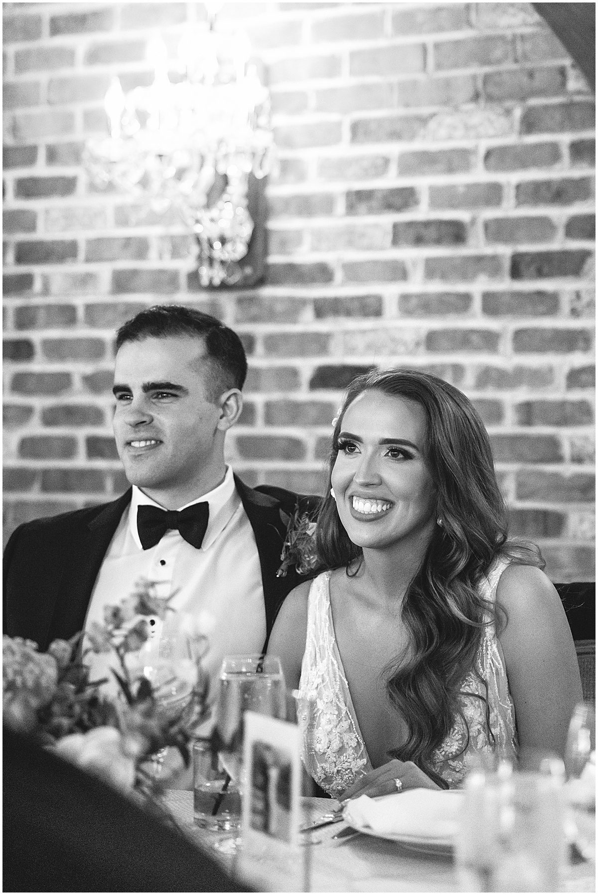 Black and White of Bride and Groom at Wedding Reception Photo