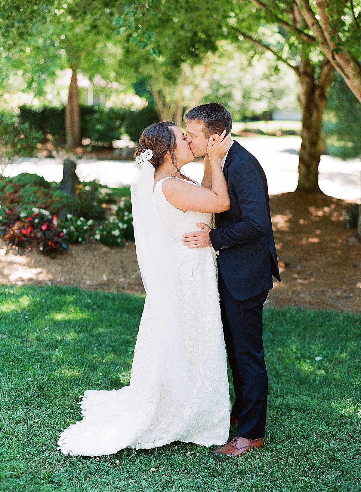 Bride and Groom Kissing Photo