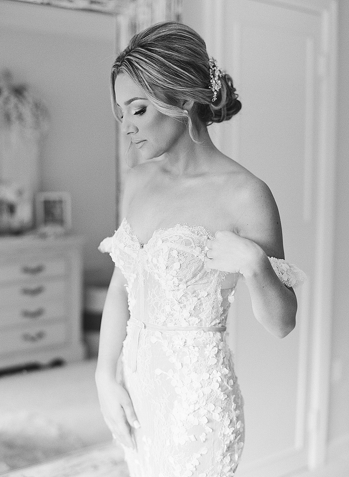 Black and White of Bride Getting Dressed Photo