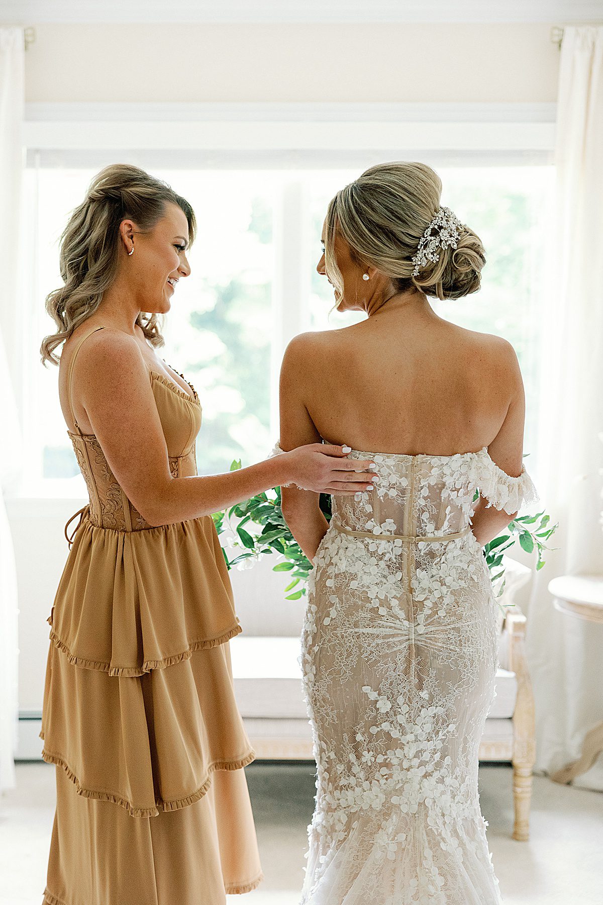Bride Getting Ready with Sister Photo