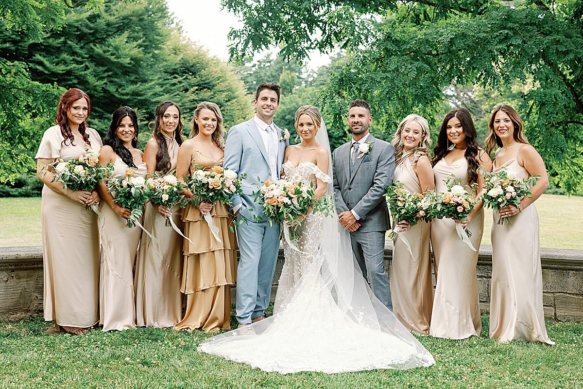 Bride and Groom With Wedding Party Photo