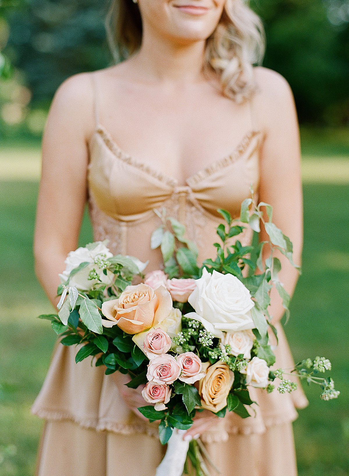 Maid of Honor Holding Bouquet of Flowers Photo