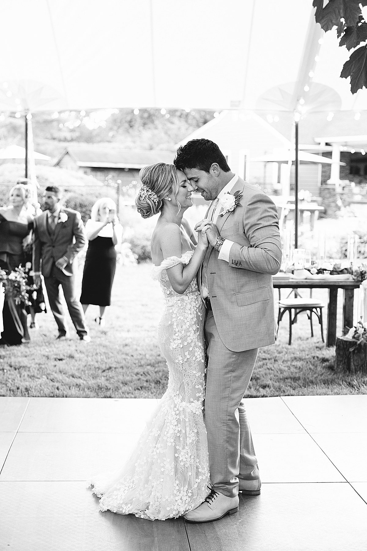 Bride and Groom Nose to Nose Dancing Photo