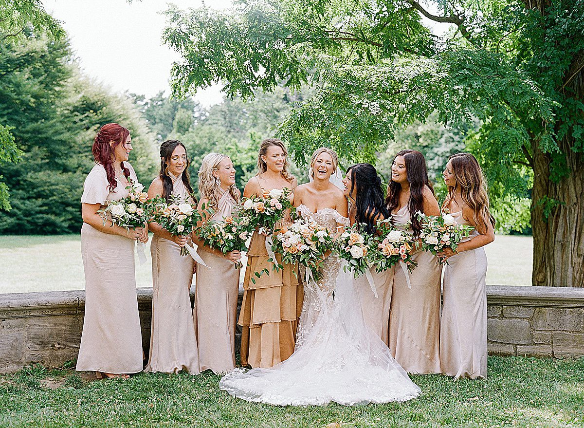 Bride with Bridesmaids Laughing Photo