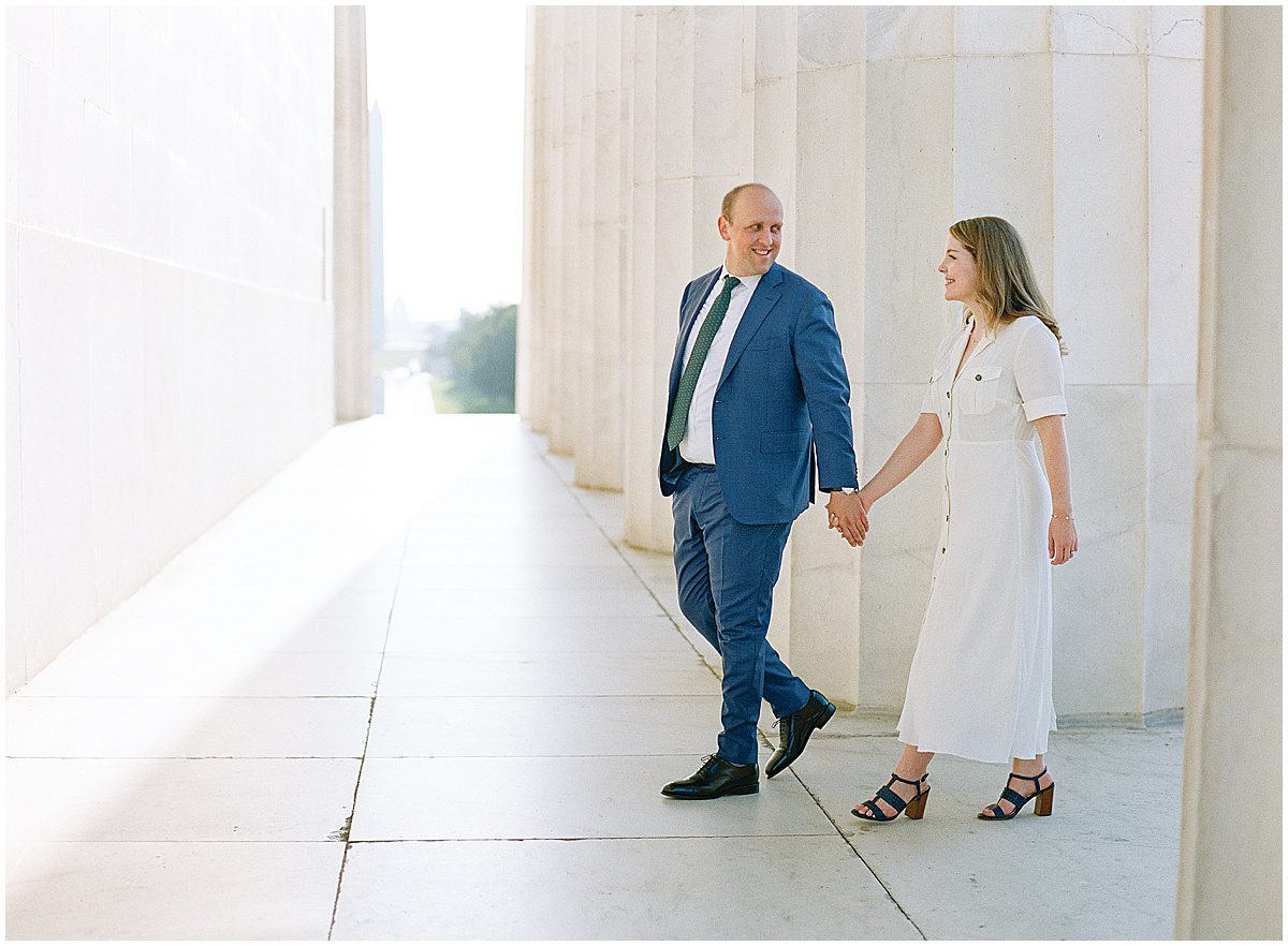 Couple Walking Holding Hands at Lincoln Memorial Photo