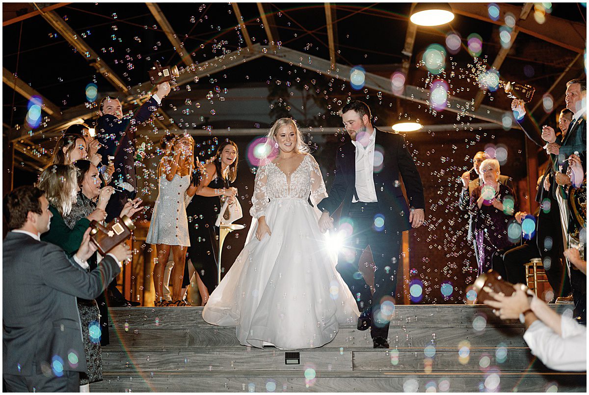 Bride and Groom Leaving Wedding in Bubble Exit Photo