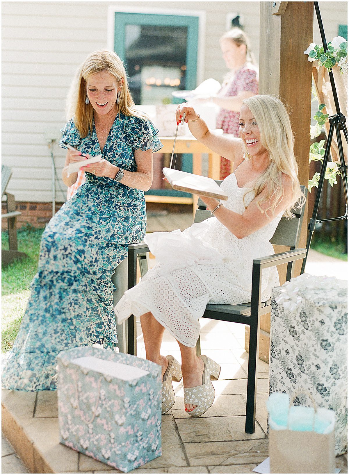 Bride and Mother of The Bride Opening Gifts at Bridal Shower Photo