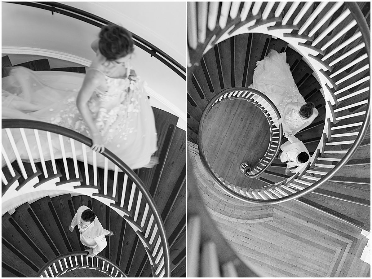 Black and White of Bride and Groom Walking Down Spiral Stairs Photos