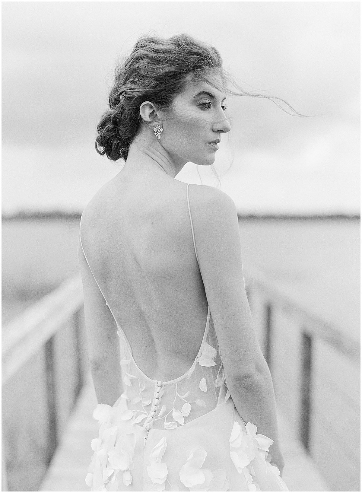 Black and White of Bride on Bridge at Lowndes Grove Wedding Venue in Charleston Photo