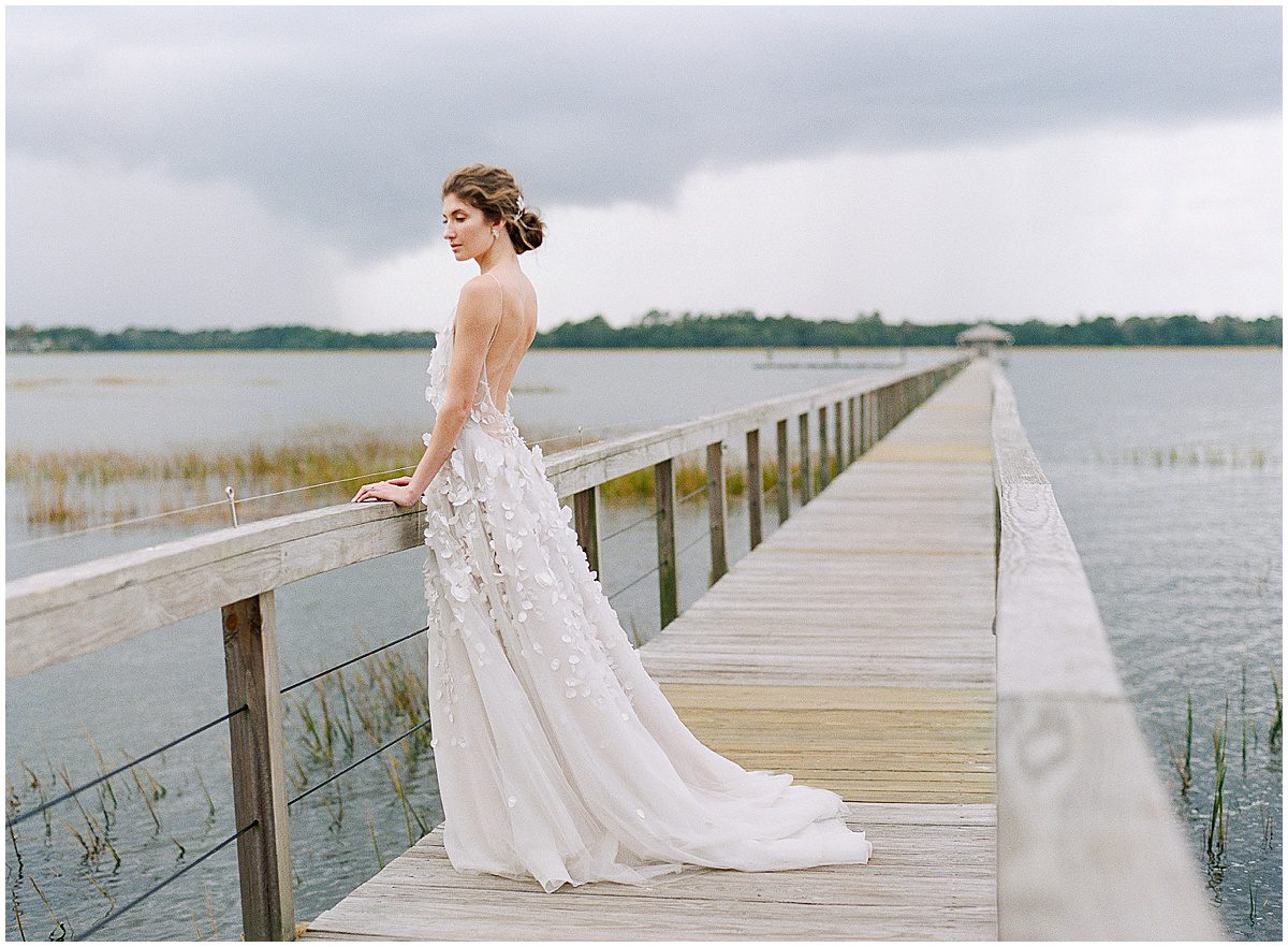 Bride on Bridge at Lowndes Grove Wedding Venue in Charleston Photo