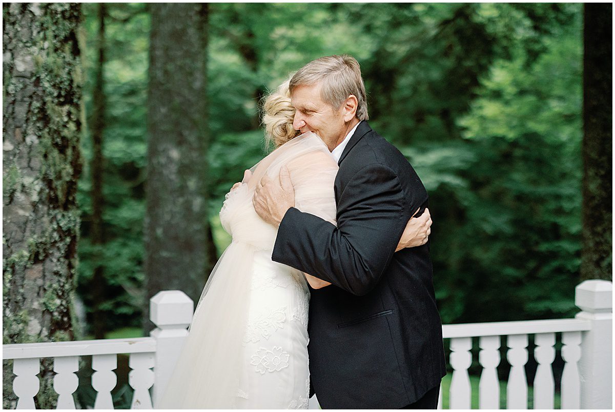 Bride and Father Hugging Photo