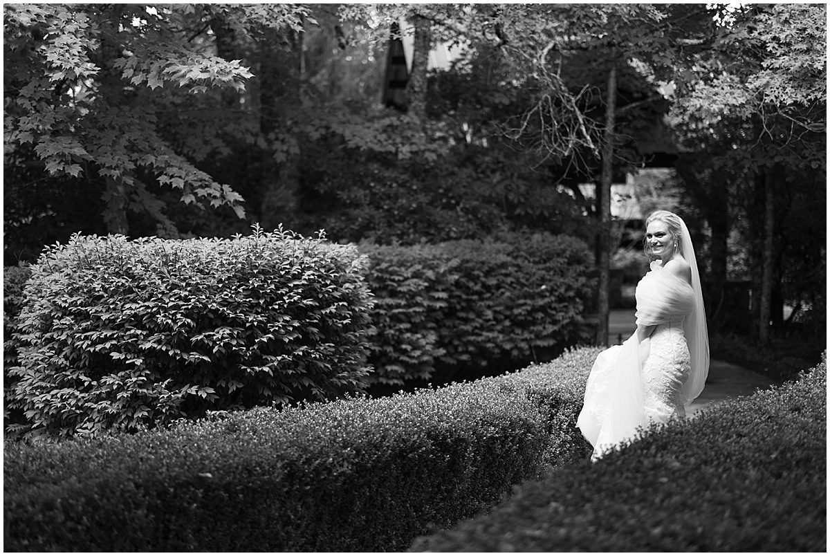 Black and White of Bride on Path at Old Edwards Inn Wedding Venue Photo