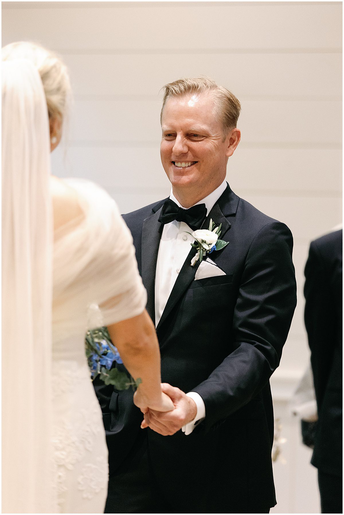 Groom Smiling During Ceremony Photo