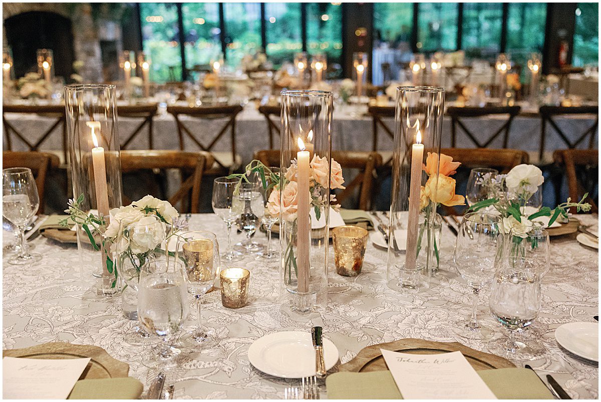 Lit Candles on Wedding Reception Tables Photo