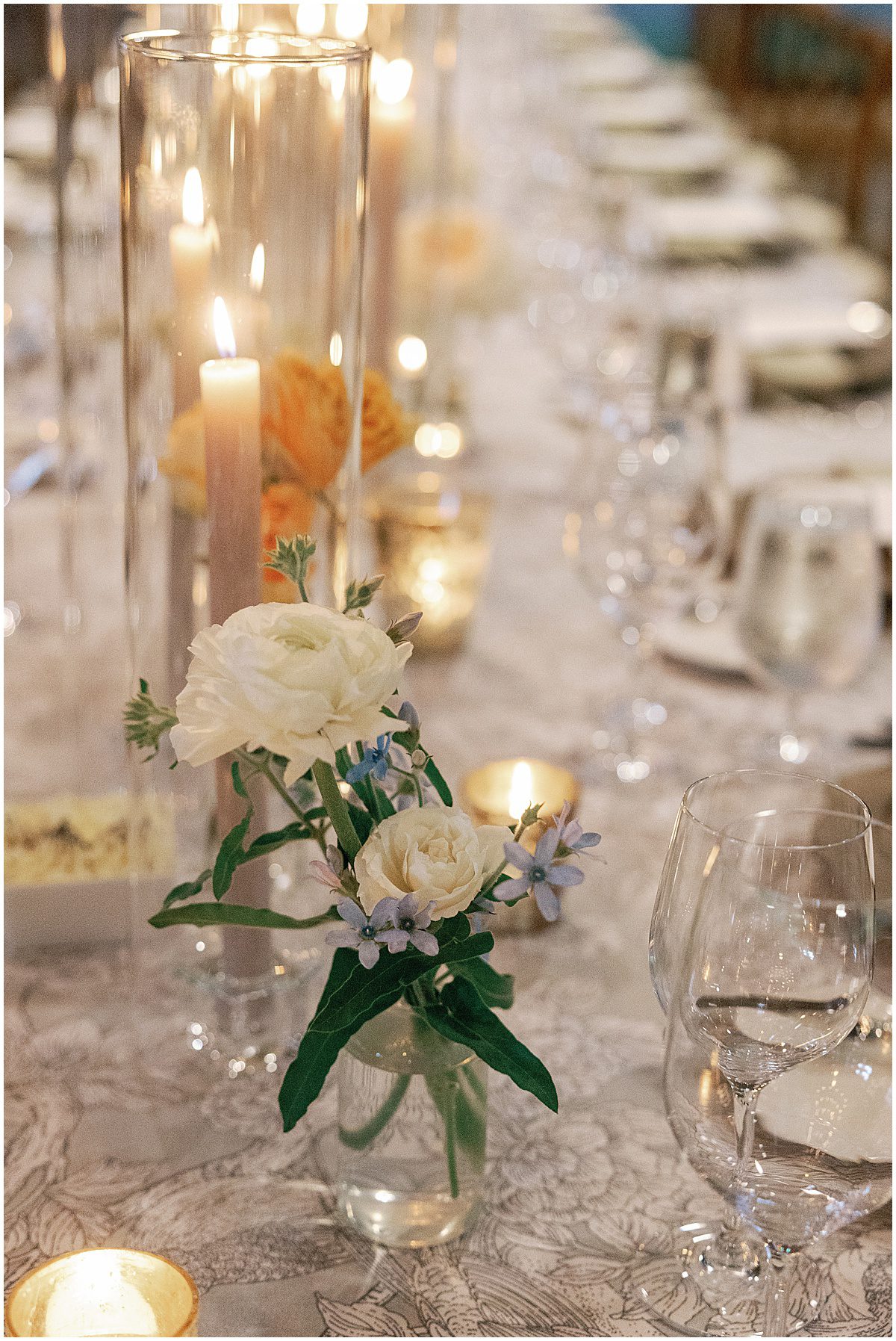 Wedding Reception Table Decor Flowers and Candles Photo