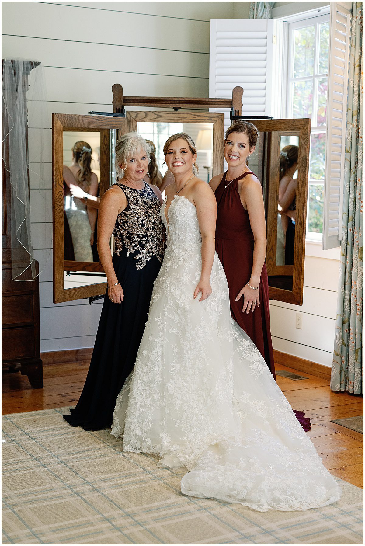 Bride Laughing with Mom and Sister Photo