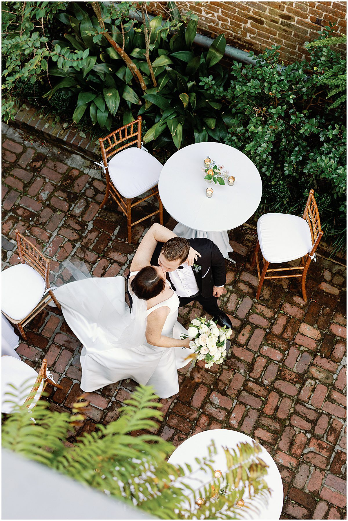Bride and Groom Kissing at The Parsonage in Charleston SC Photo