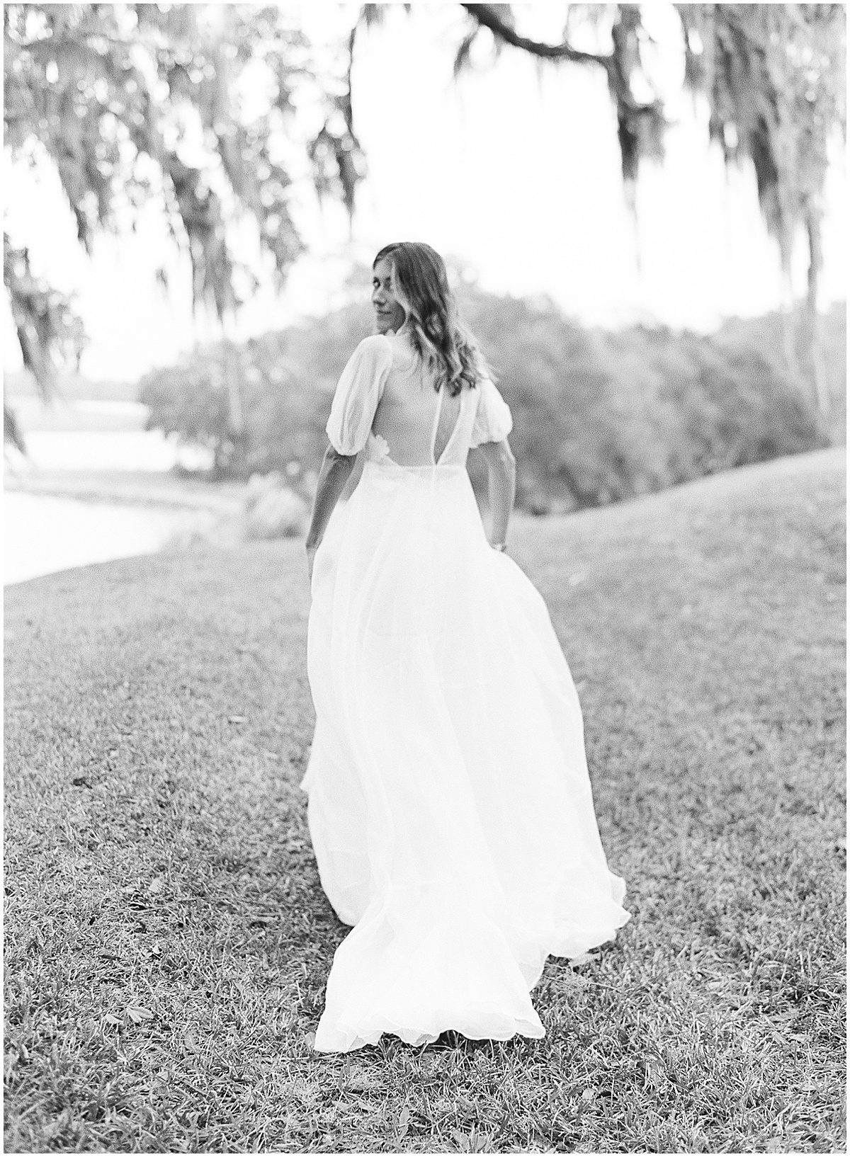 Black and White of Bride Walking Away Photo