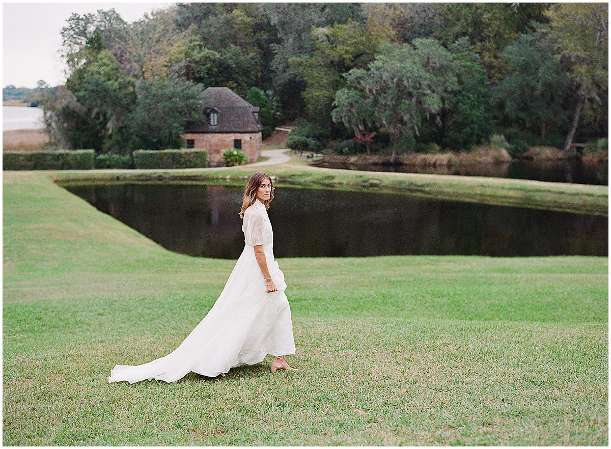 Bride Walking in Front of Butterfly Pond at Middleton Place in Charleston SC Photo