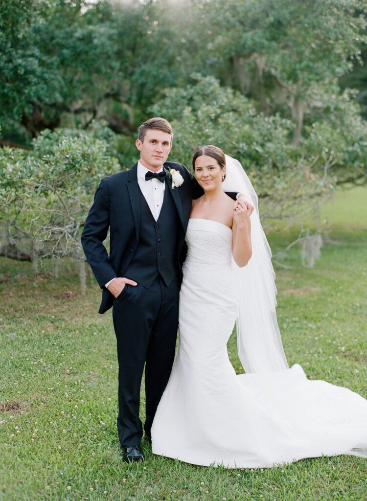 Bride and Groom Looking at Camera 