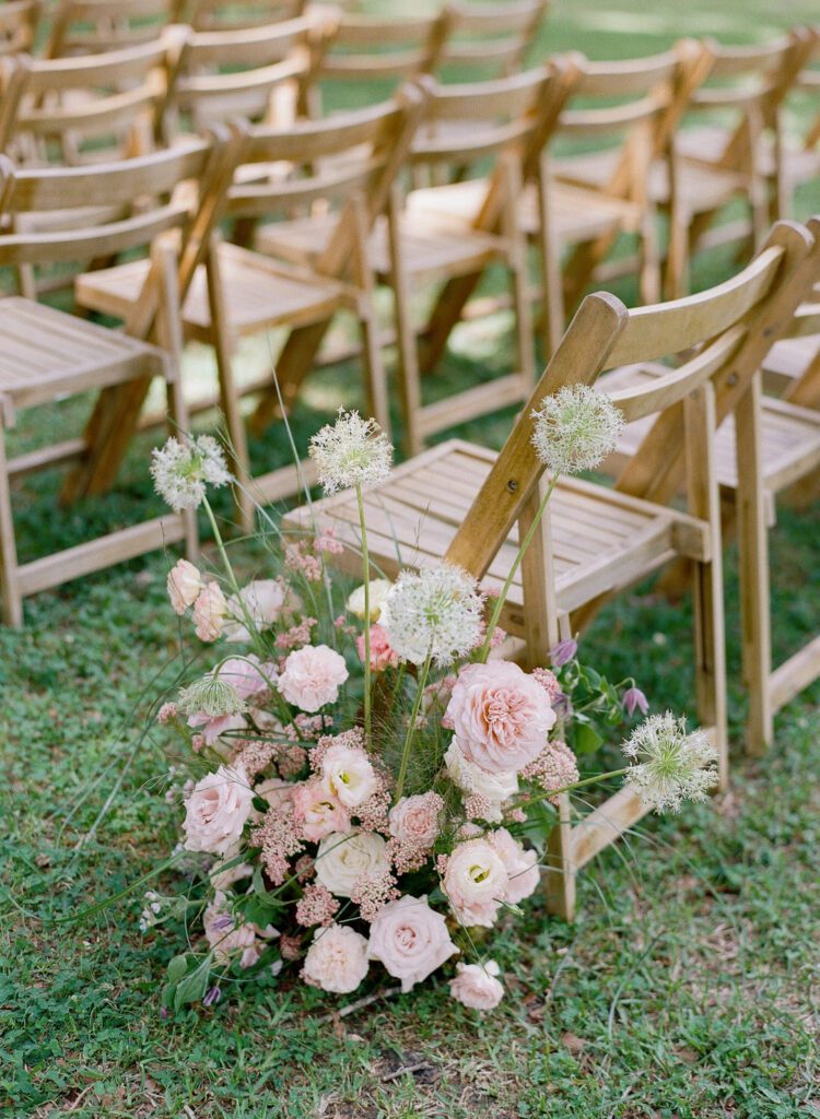 flower arrangement in front of chair 